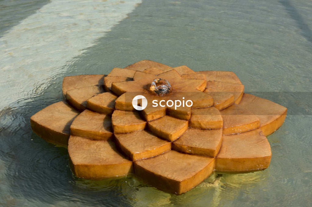 Brown and beige wooden round table