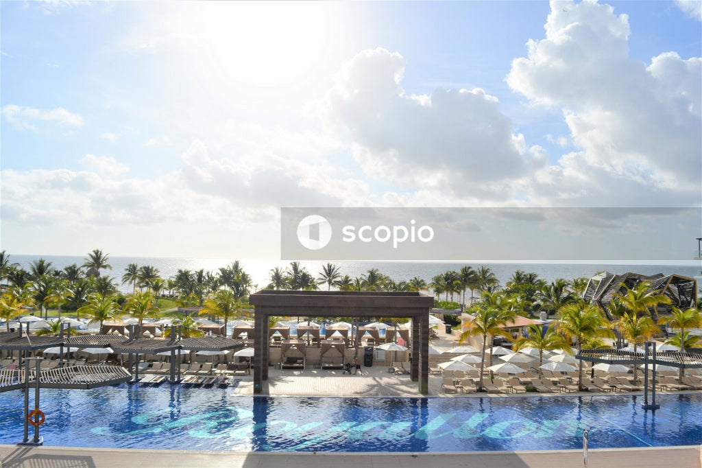 Brown wooden chairs on swimming pool