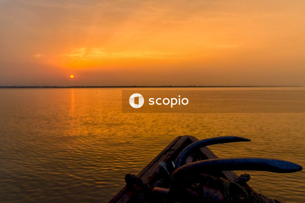 Boat, sunset on lake