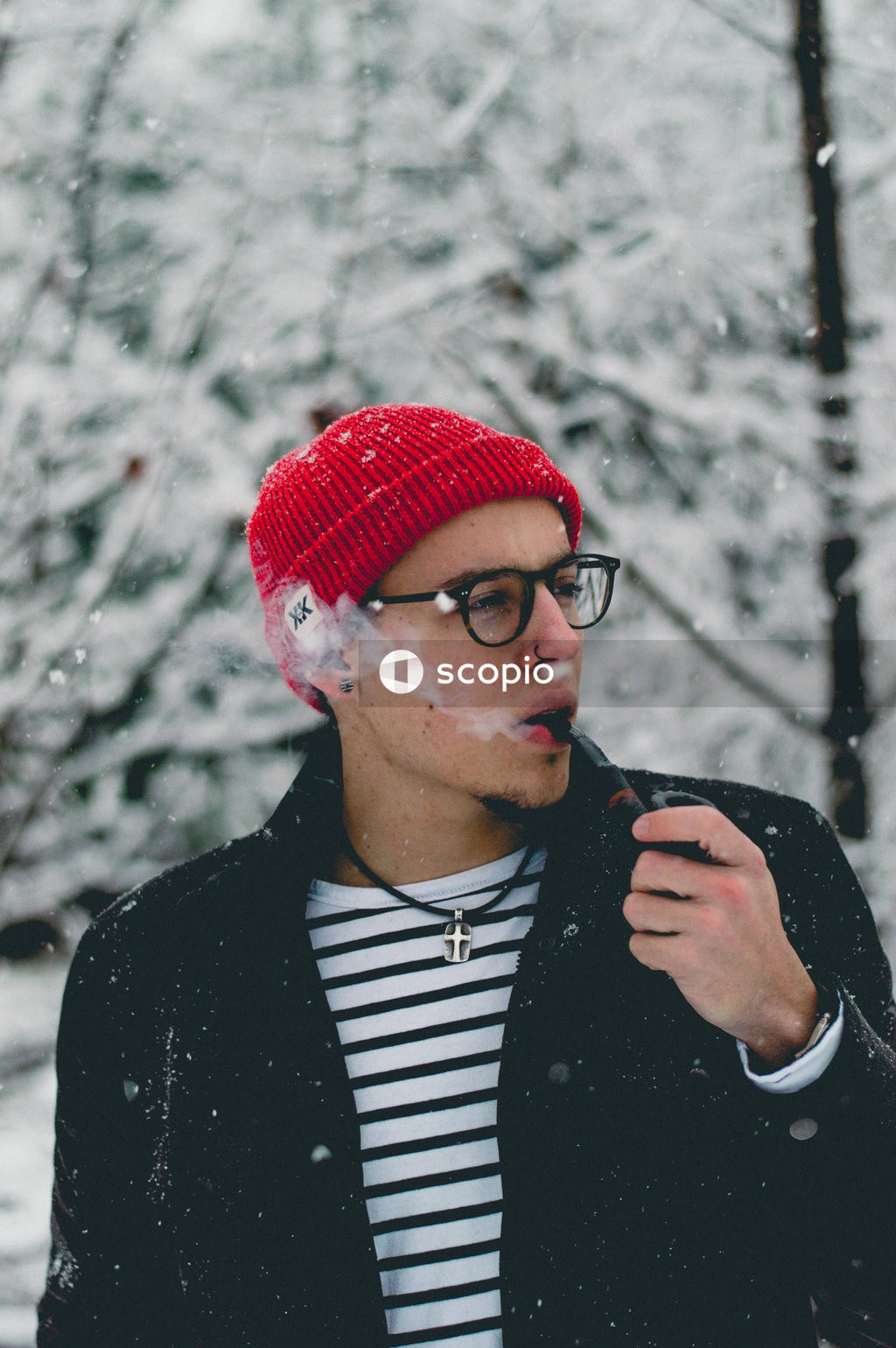 Man wearing red knit cap