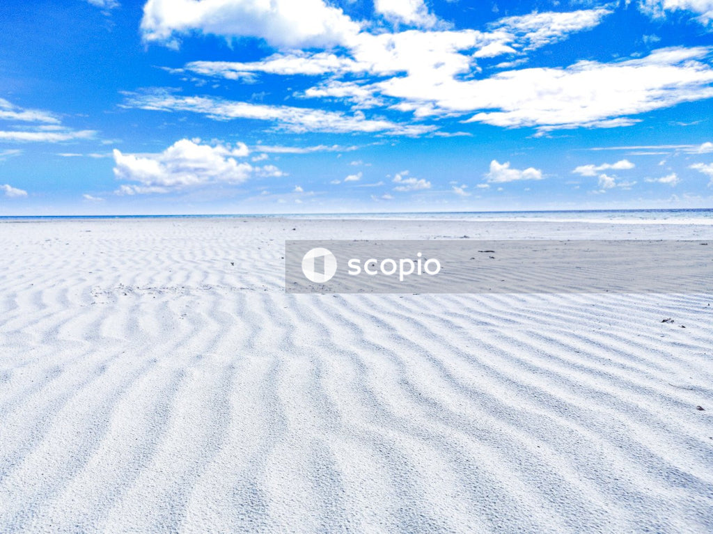White sand under blue sky