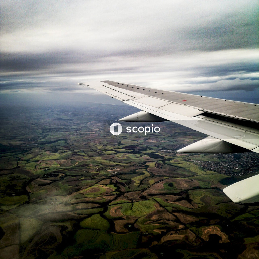 White airplane wing over the clouds