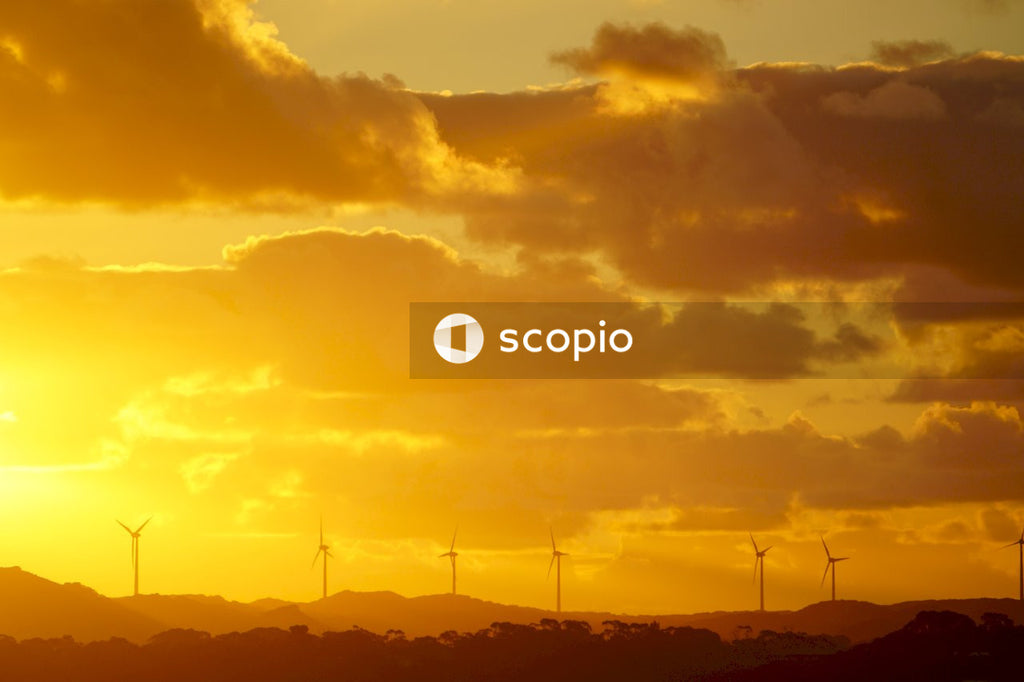 Silhouette of mountain under cloudy sky during sunset