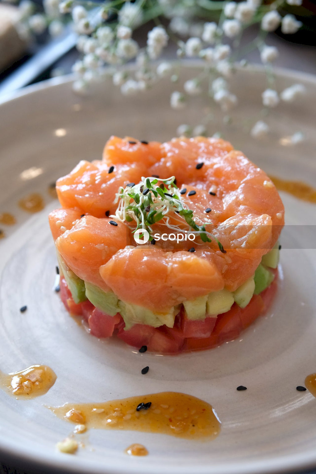 Orange and green vegetable salad on white ceramic plate