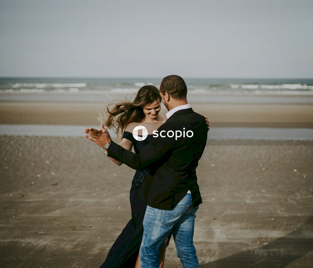 Man and woman dancing on brown groundutime