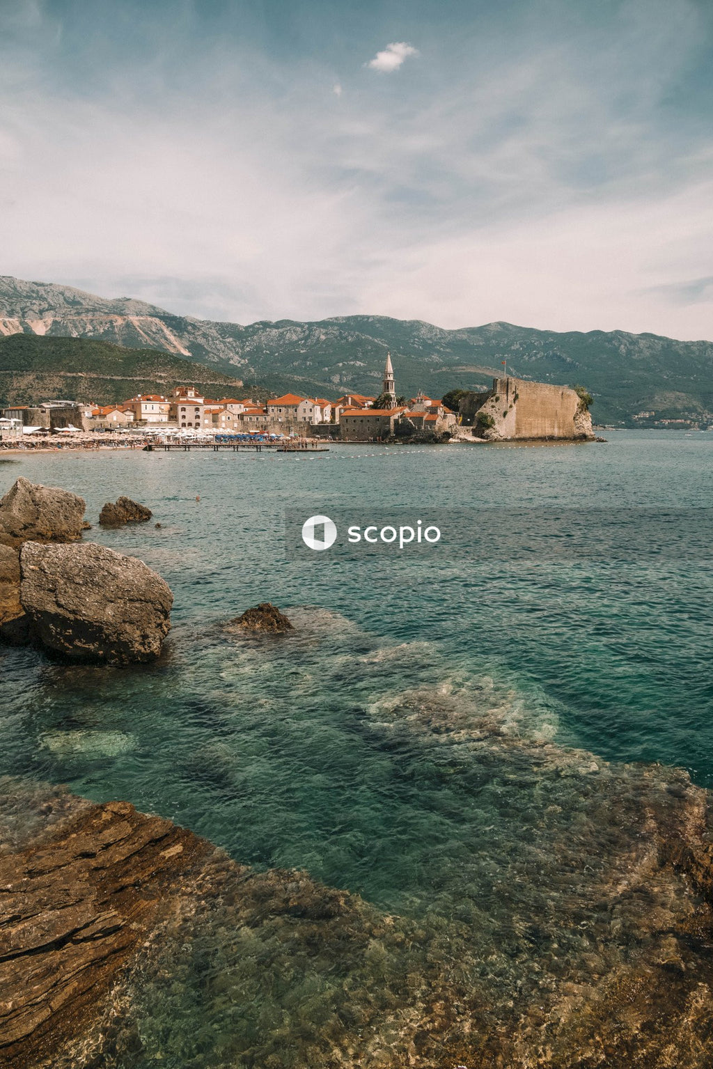 Budva Old Town across body of water in Montenegro