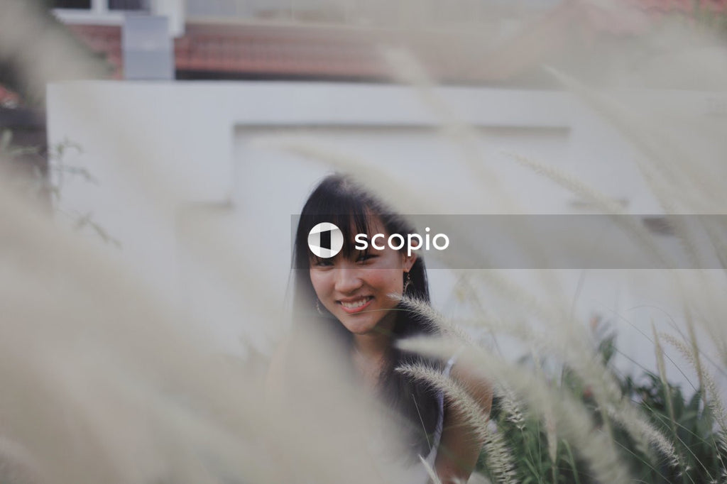 Woman in white and black striped shirt