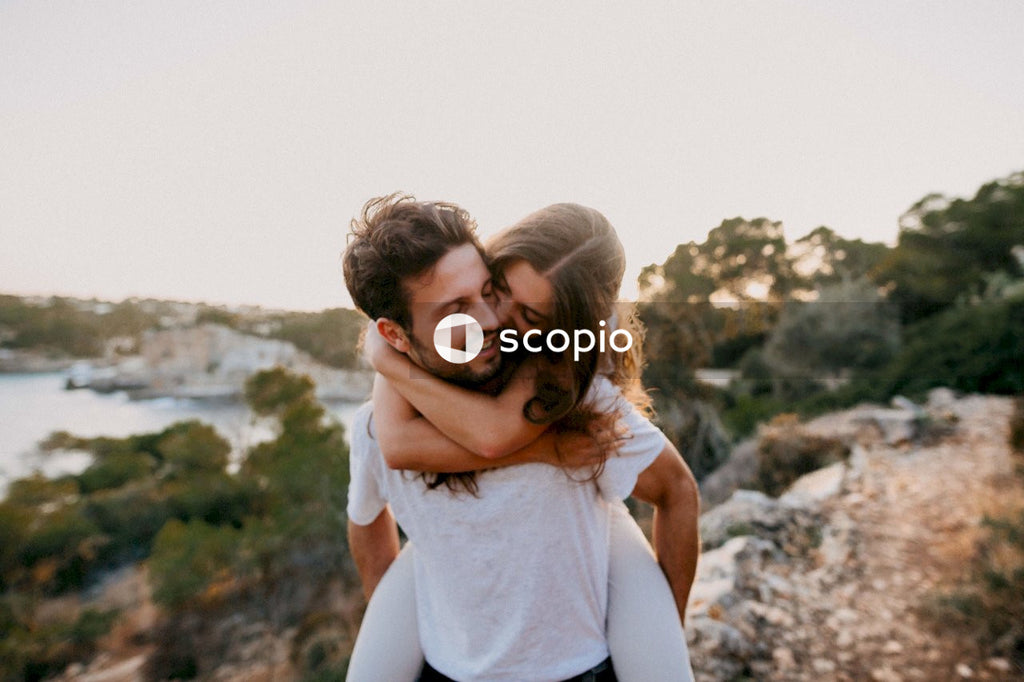 Man carrying woman on his back