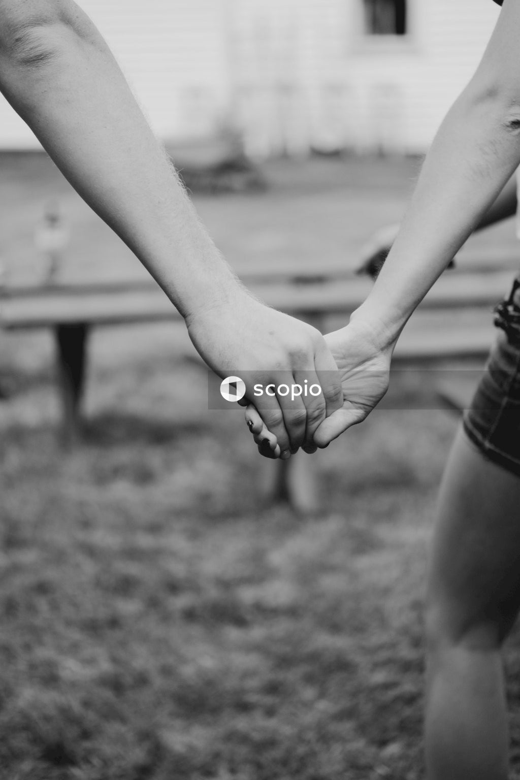 Man and woman holding hands