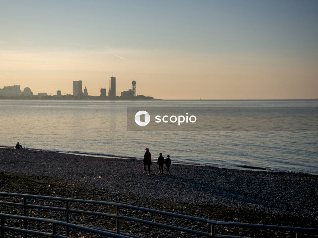 2 person standing on beach