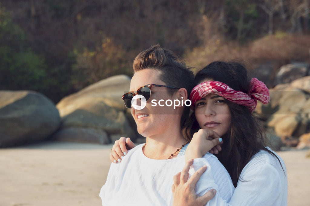 Lesbian couple by the ocean