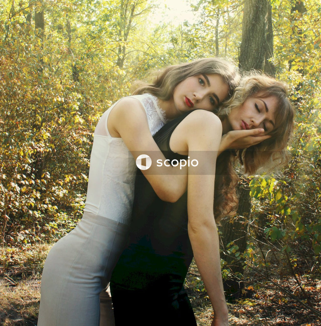 2 women hugging each other
