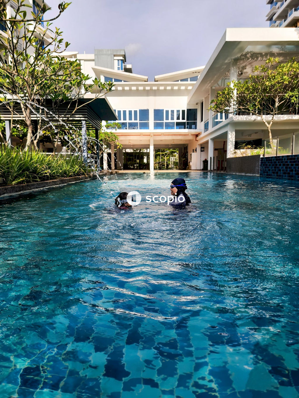 2 women in swimming pool