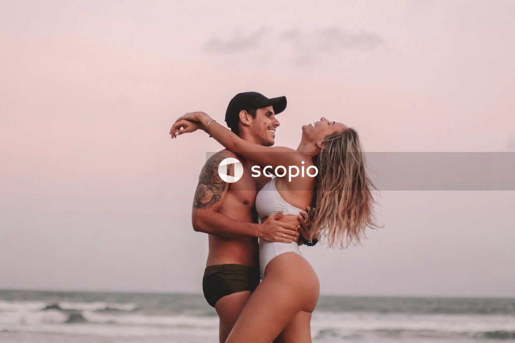 Man and woman hugging at the beach