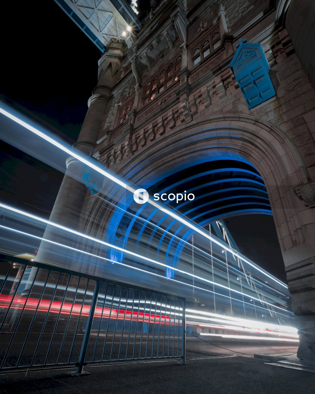 Time-lapse photo of cars' light in Tower Bridge in London during nighttime