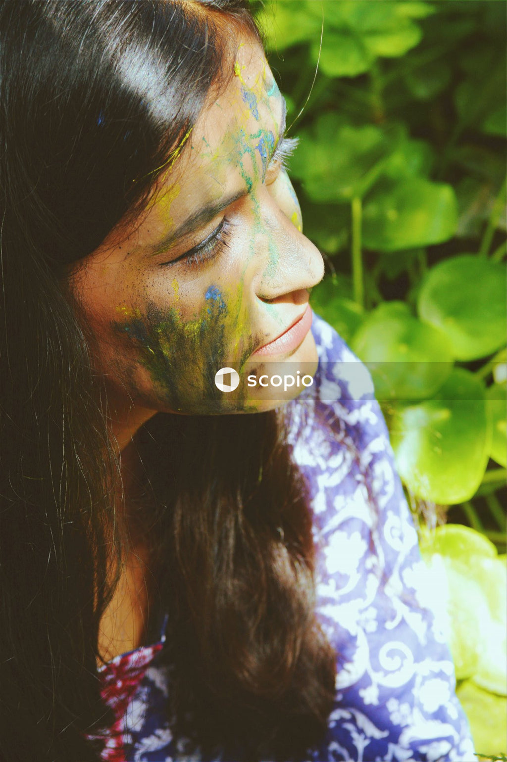 Woman with face paint on her face