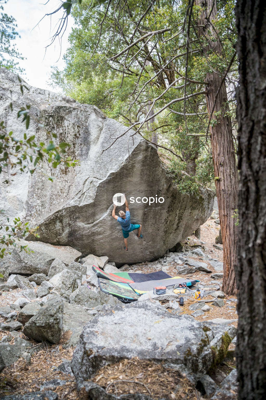 Person climb up on rock