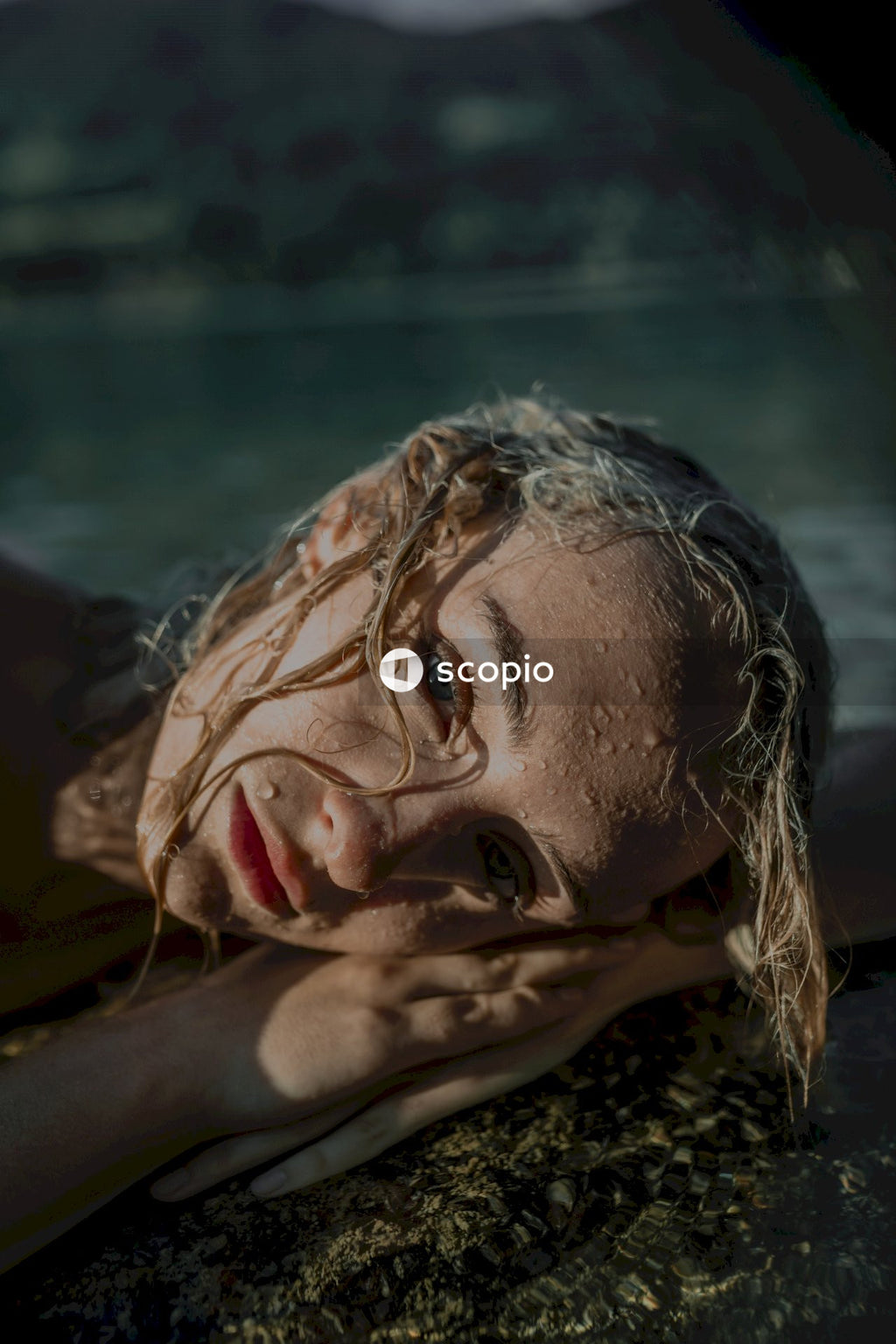 Woman resting on beach