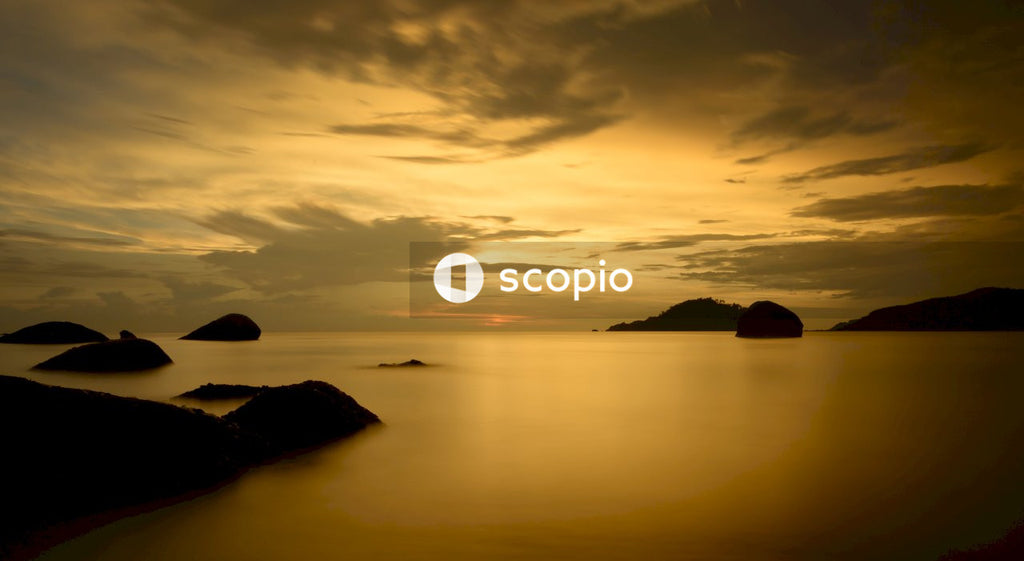 Silhouette of rocks on water during golden hour