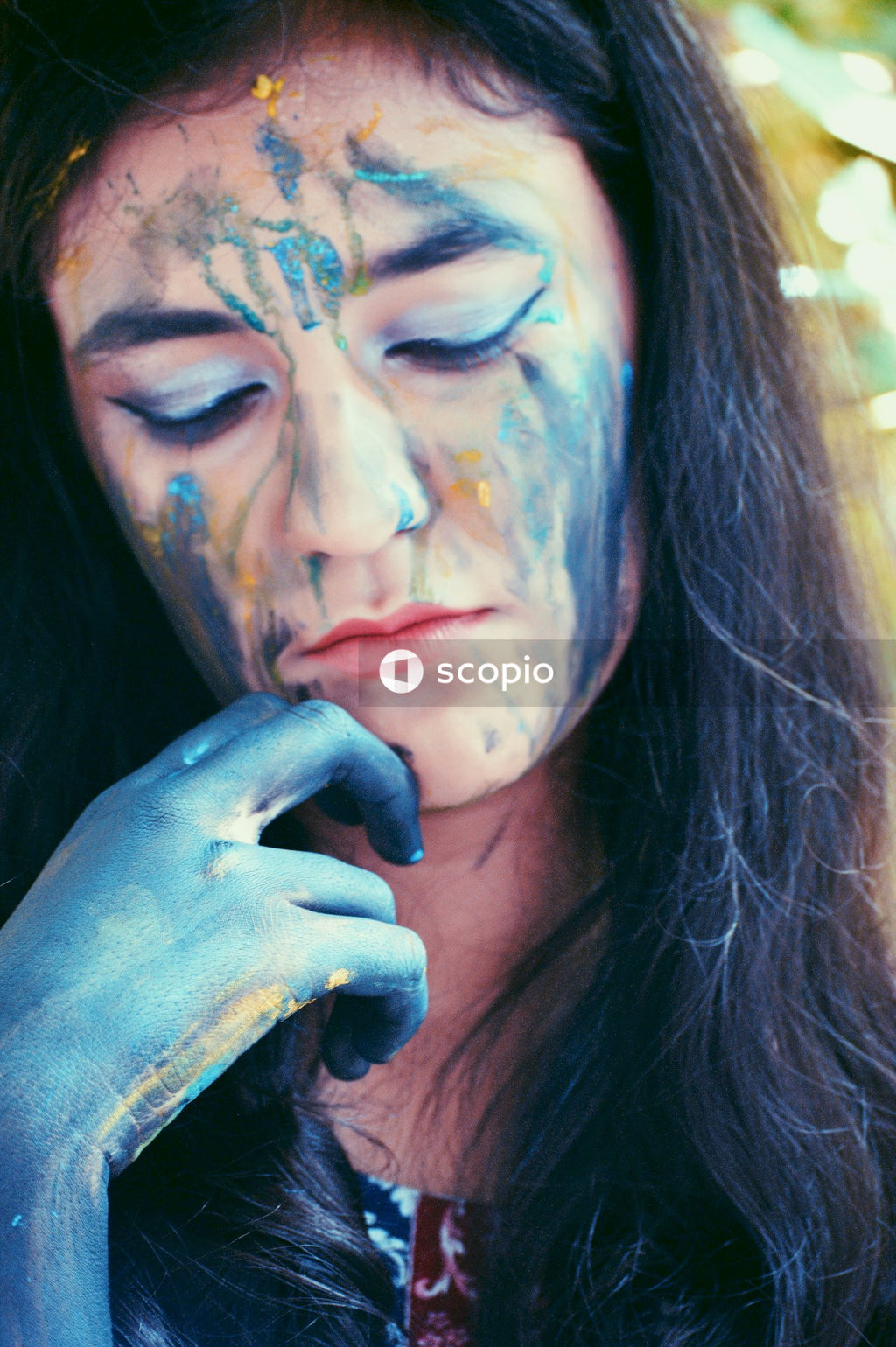 Woman with face paint on her face
