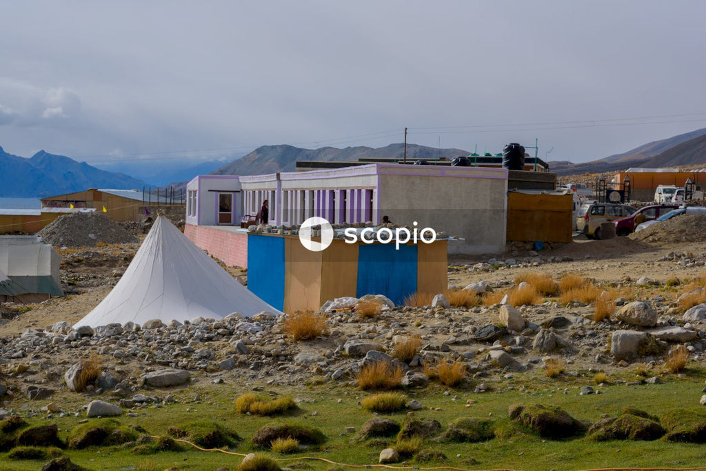 White tent on green grass field