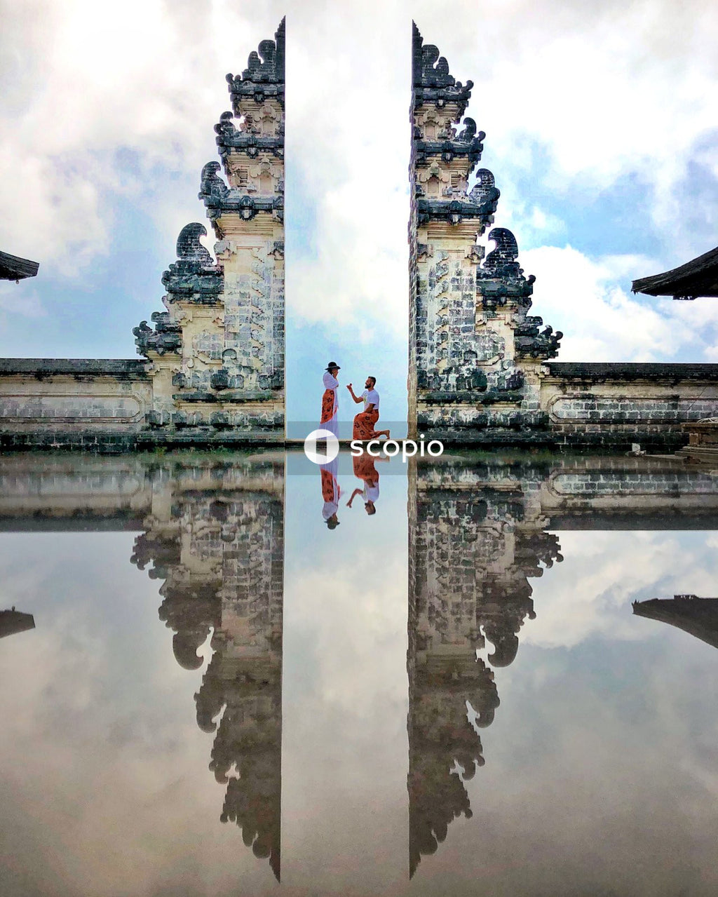 Man proposing to a woman at the Penataran Lempuyang monument