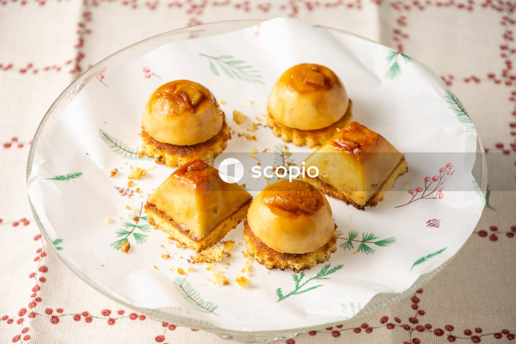 3 brown cupcakes on white ceramic plate