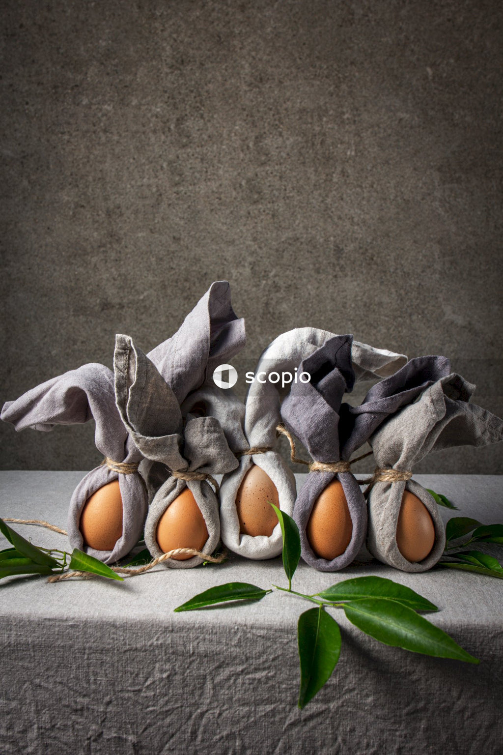 3 brown eggs on green leaf