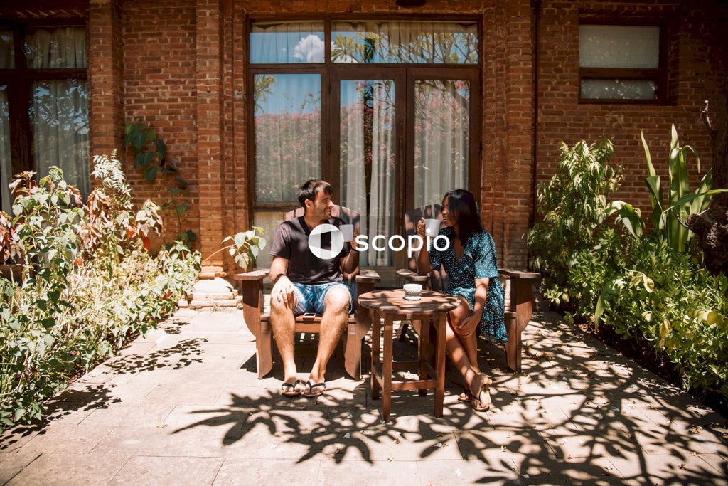 Man and woman drinking coffee outdoor