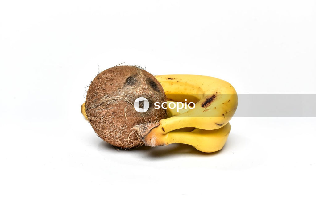 Brown fruit on white surface