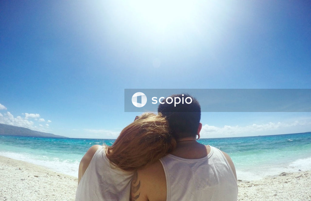 Couple sitting on beach