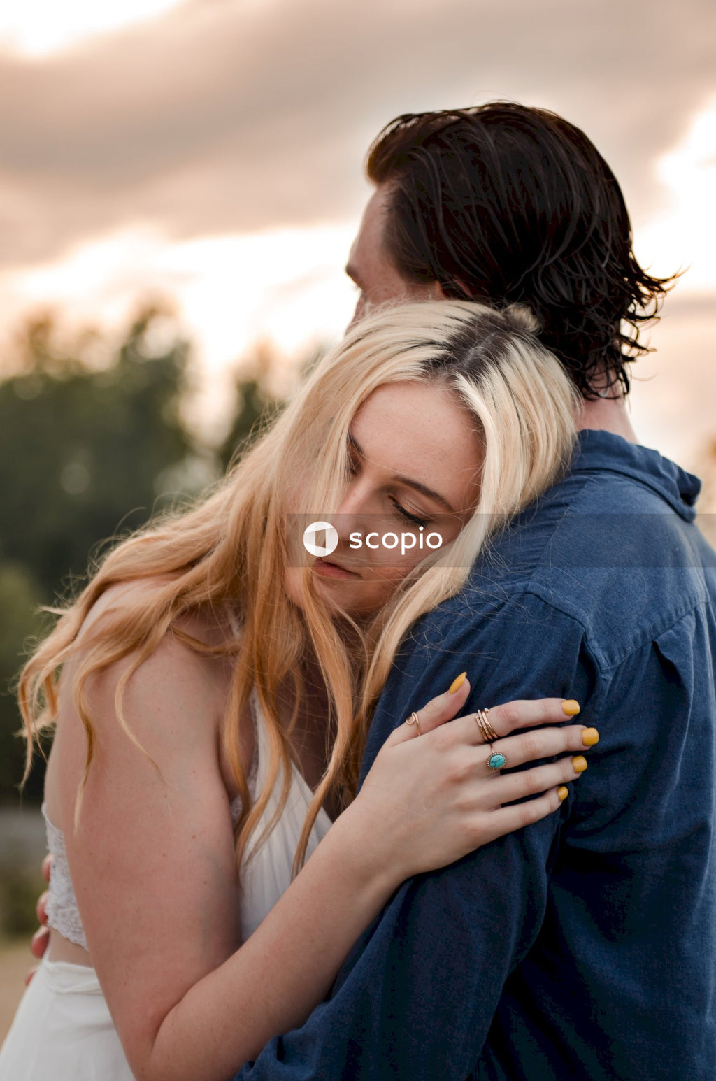 Woman embracing man