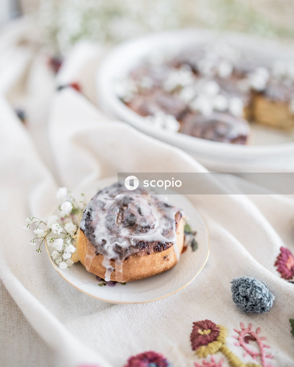 Brown bread with white cream on white ceramic plate