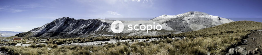 White and gray mountain under blue sky