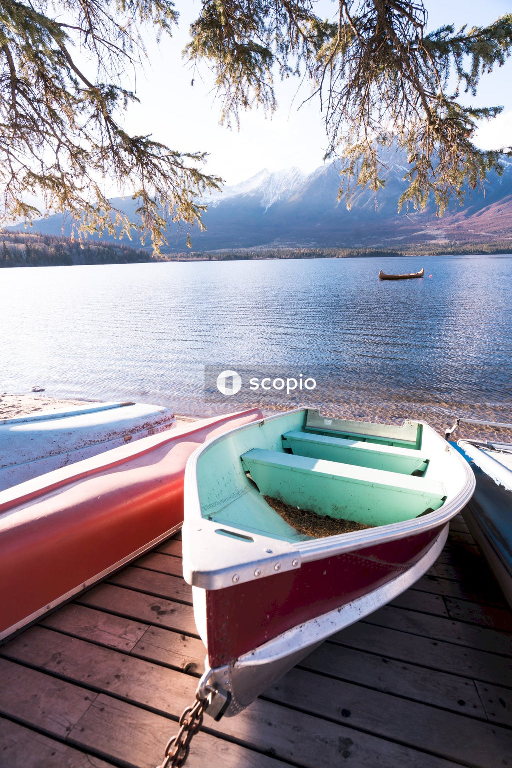 Boats slanted onto dock