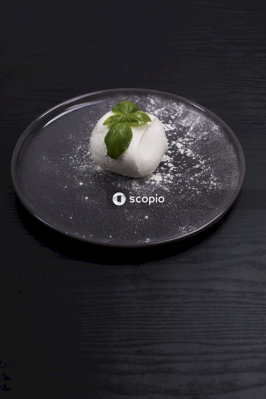 White cream on stainless steel round plate