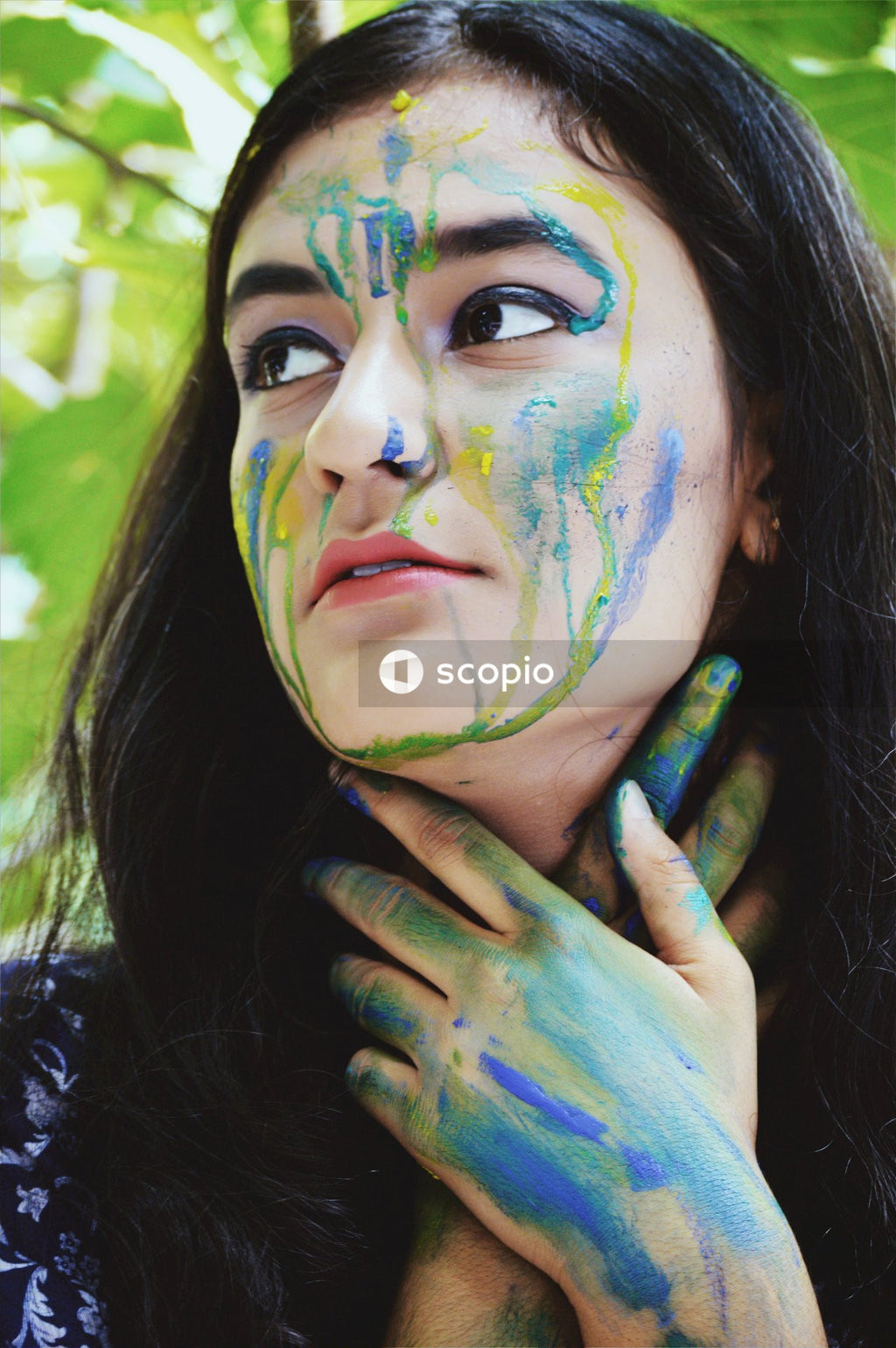 Woman with face paint on her face