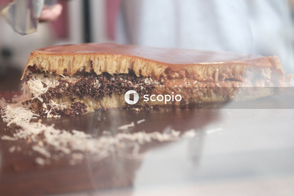 Brown cake on white table