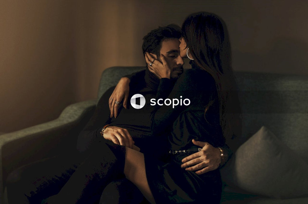 Man and woman sitting on couch