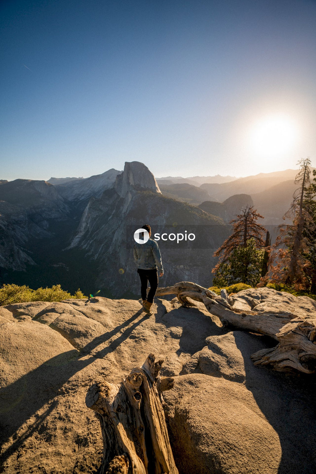 Man standing on top of mountain