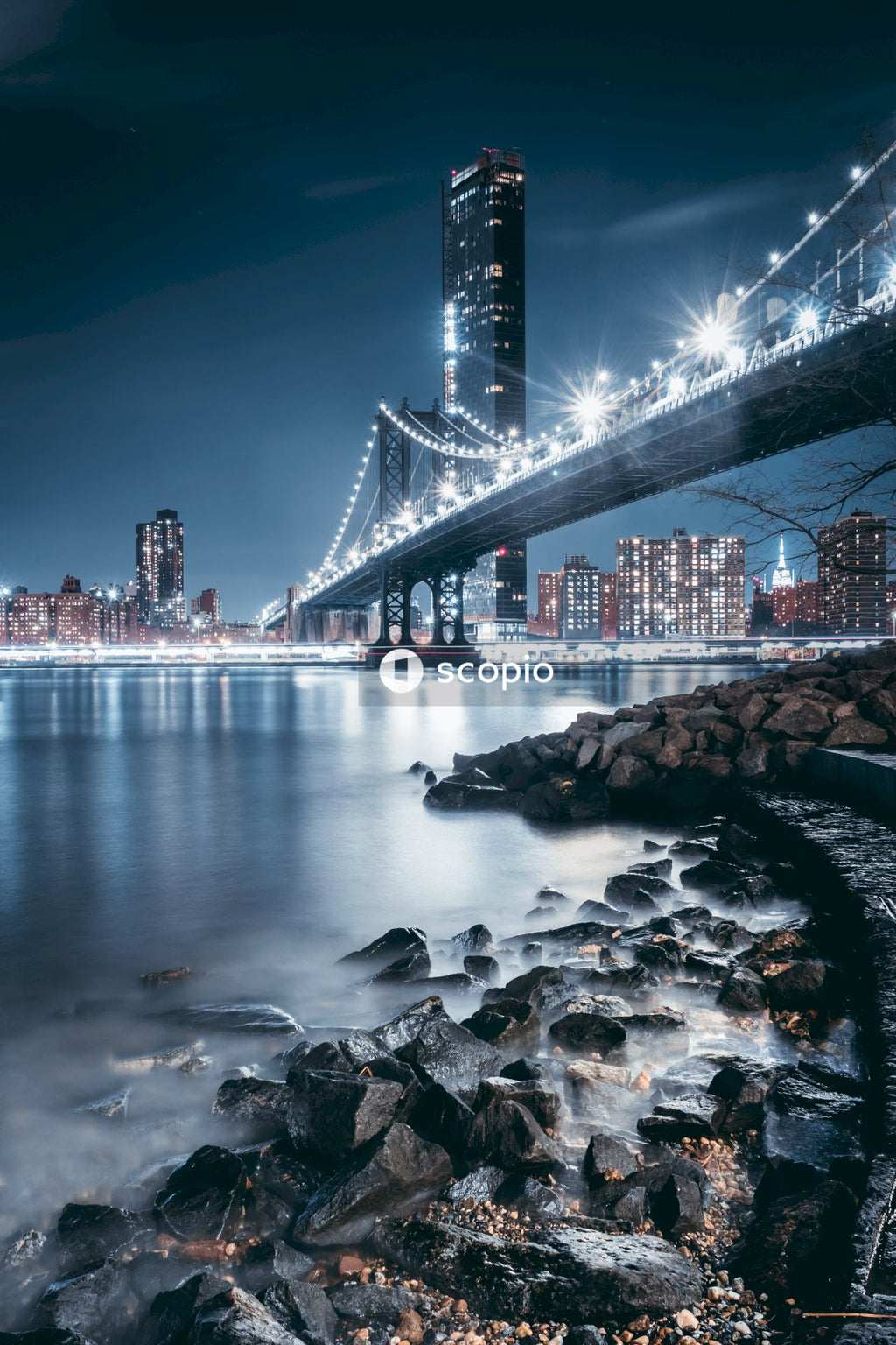 Bridge over water during night time
