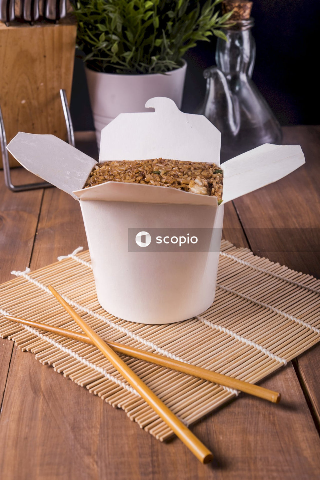 White plastic bucket with brown food