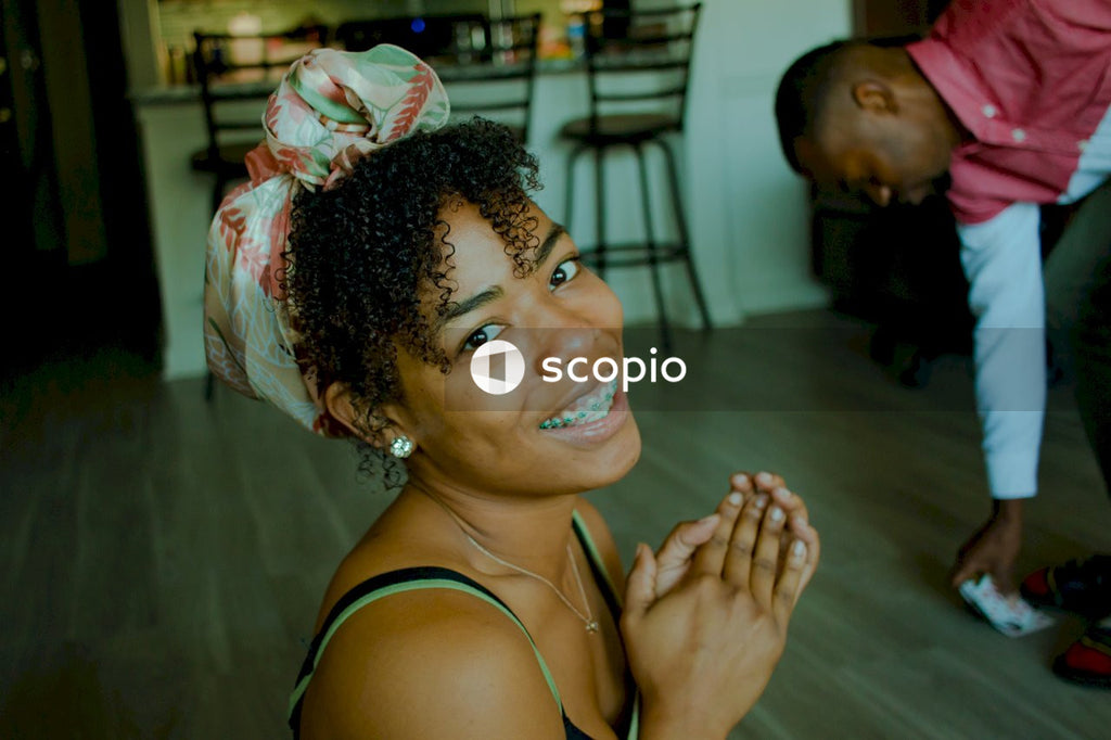 Smiling woman with floral bandana indoor