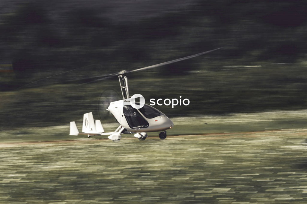 White helicopter on green grass field