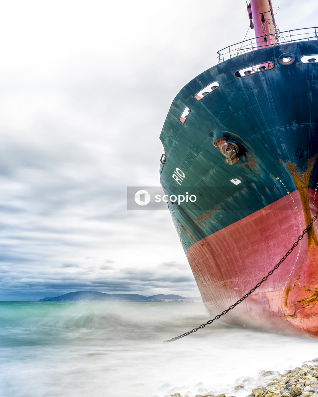 Stranded Cargo Ship on Rocky Beach