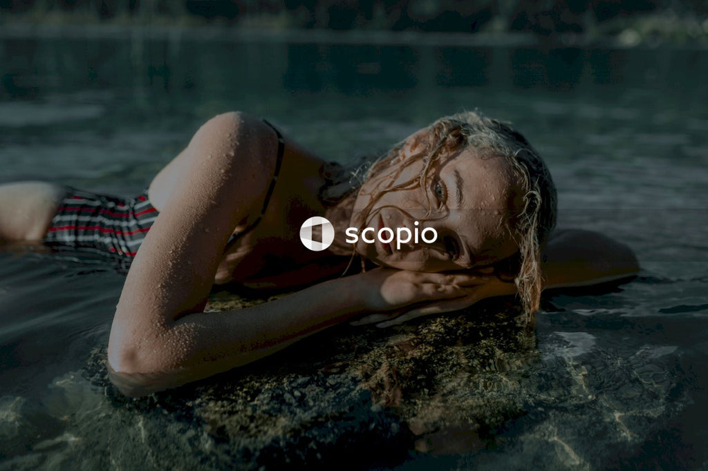 Woman in bathing suit in body of water