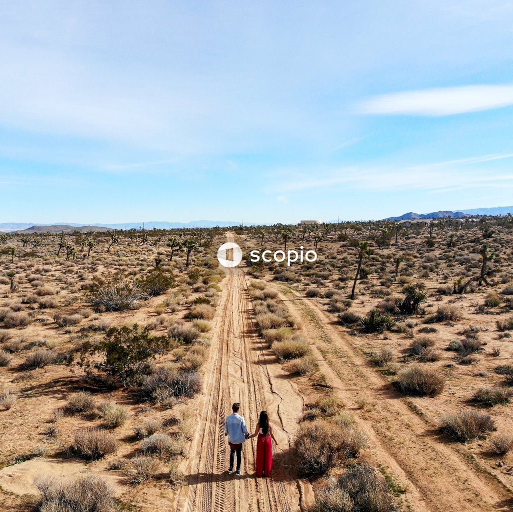 People walking on dirt road