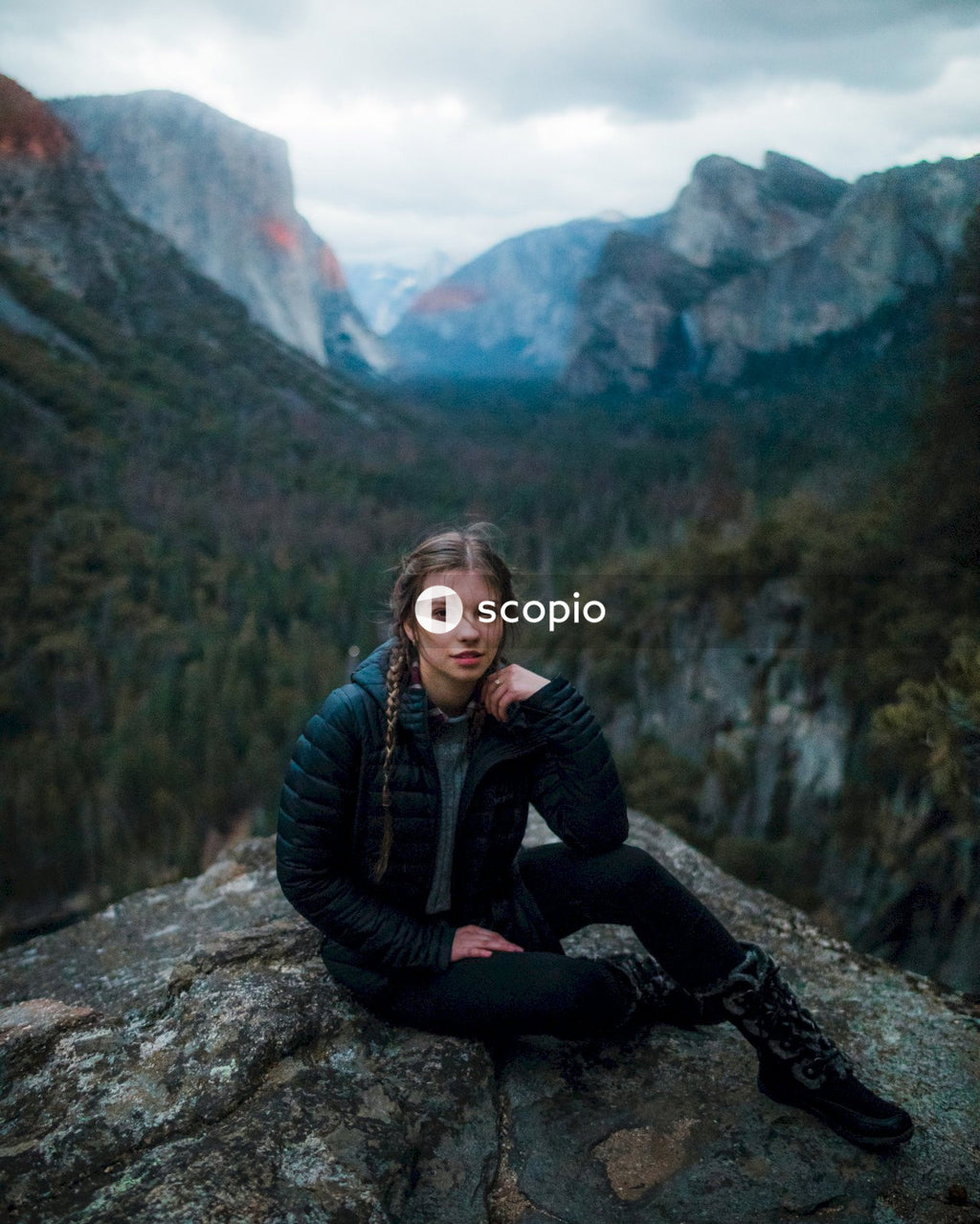 Woman posing for picture on a hike