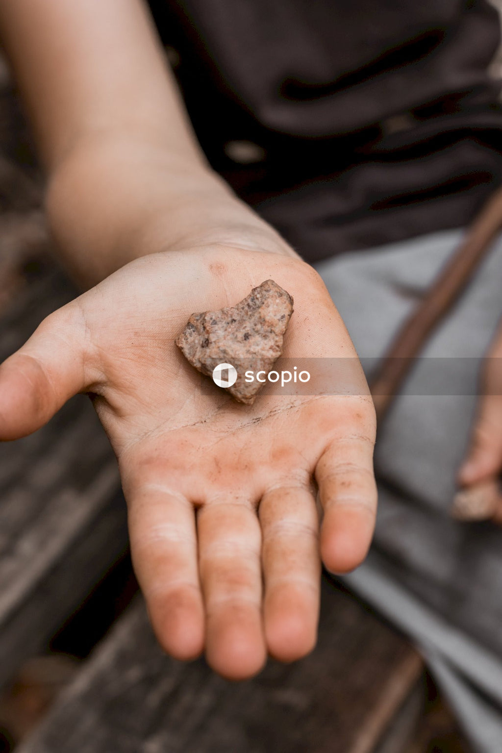 Heart shaped stone in  hand