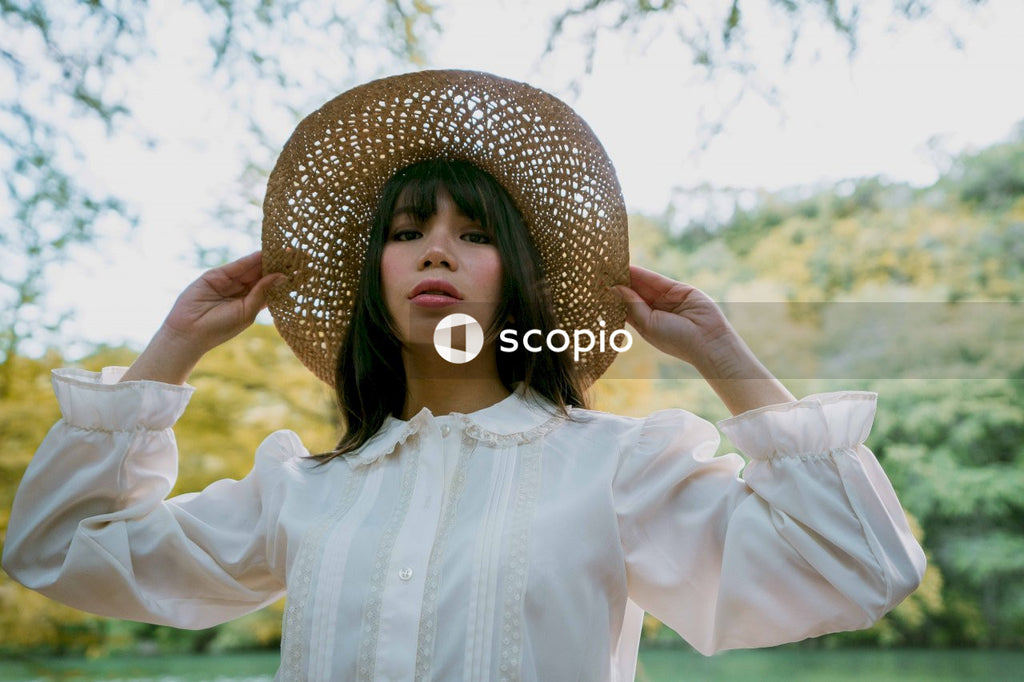 Woman wearing brown straw hat during daytime